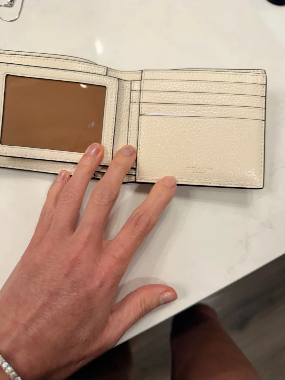 Coach Men’s Pebbled Leather Bifold Wallet — Cream